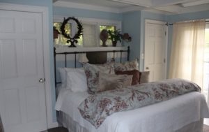 Bedroom of cottage 5 at Hope and Glory Inn