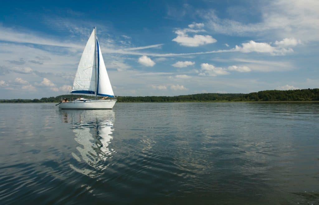 People on a sailboat enjoying one of the best things to do in Deltaville, VA
